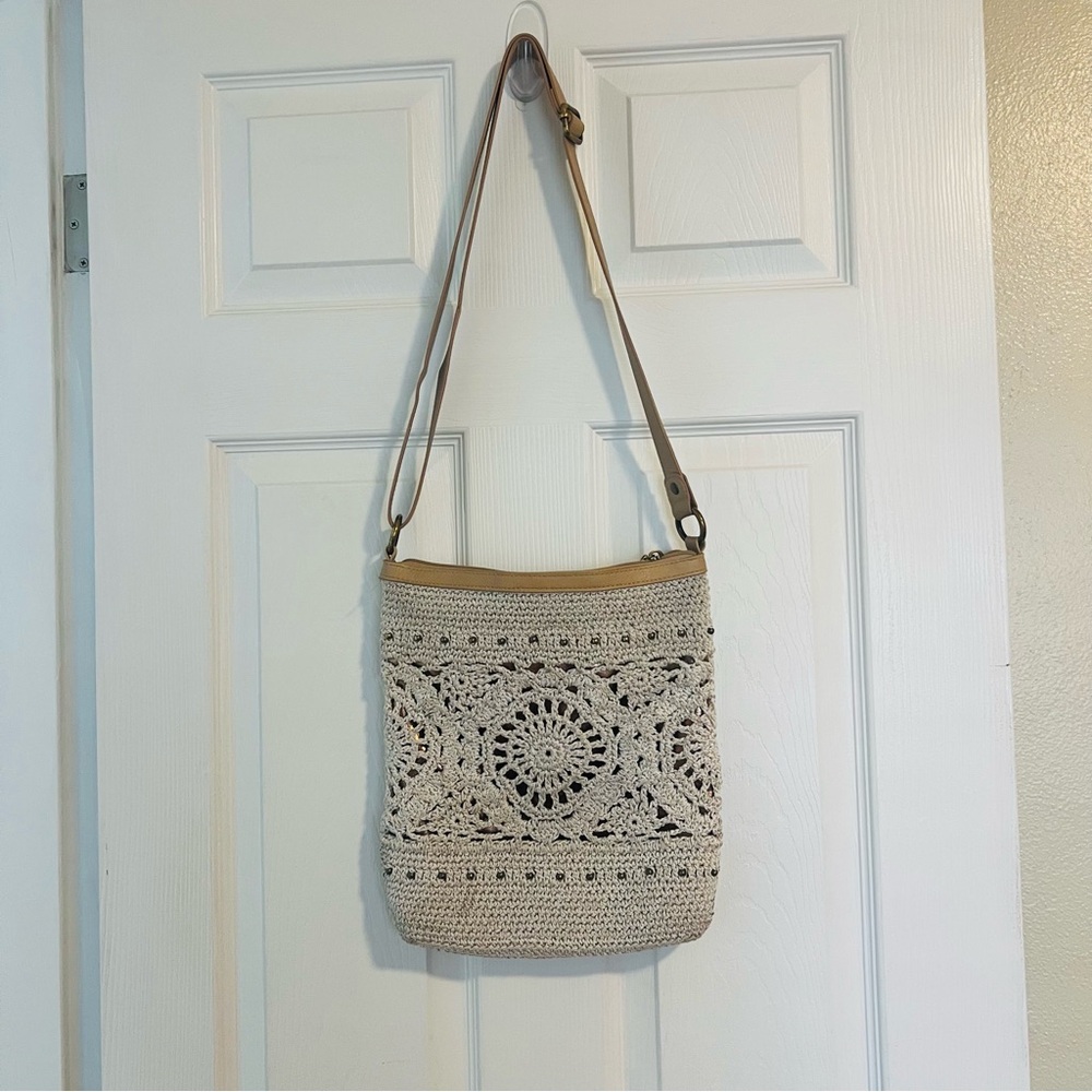 The Sak Crochet Shoulder Bag in Cream and Tan with Bronze Underlay